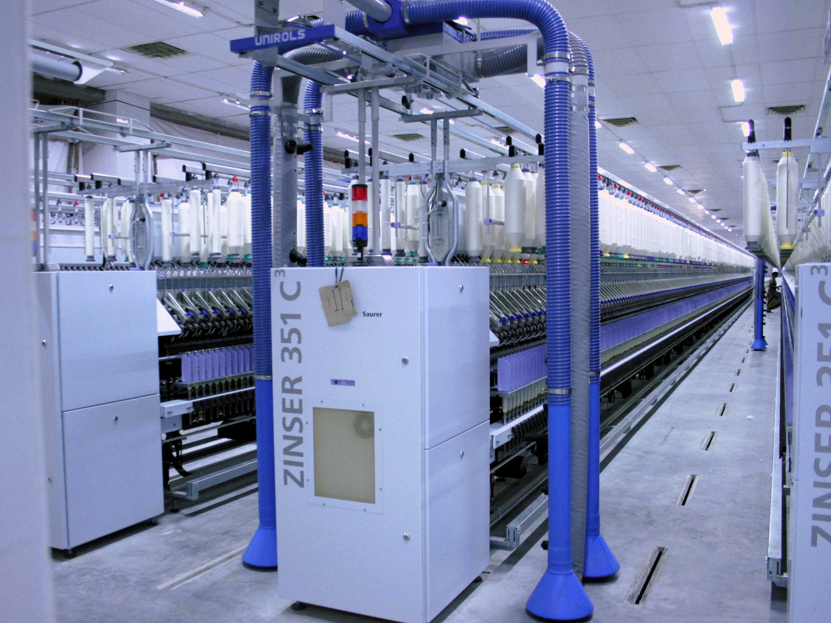 Overhead travelling cleaner - for spinning units - Belt driven travelling cleaner